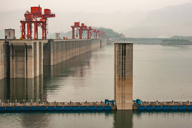 istock Up-river closeup of Three Gorges Dam, China. 1217897596