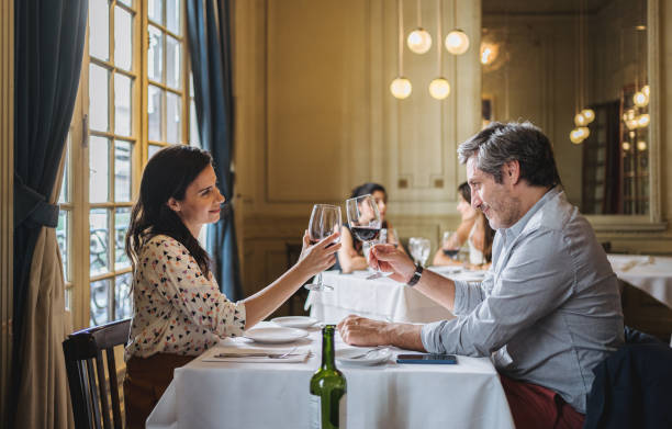 istock Serene couple in love making a celebratory toast 1217897749