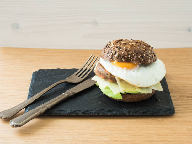 istock vegetarian cheeseburger on a slate plate 1217898725