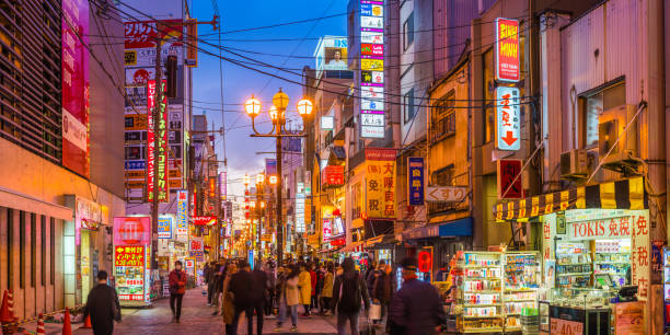 istock Neon night crowded streets shoppers restaurants panorama Dotonbori Osaka Japan 1217903839