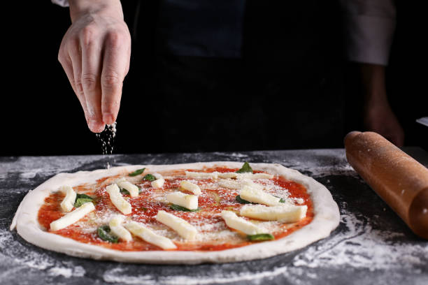 istock Making pizza at an Italian restaurant 1217904582