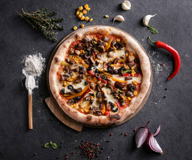 whole italian pizza on wooden table with ingredients - pepperoni pizza green olive italian cuisine tomato sauce imagens e fotografias de stock