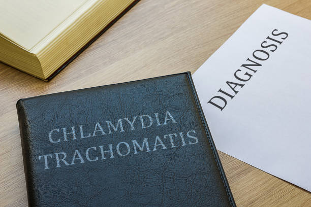 istock Book about Chlamydia Trachomatis on the wooden table 1217908329