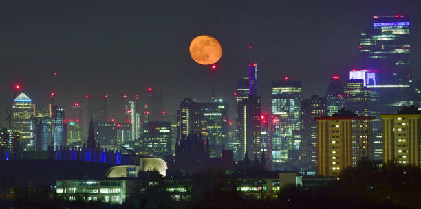 istock Moon rise over London Cityscape 1217911140