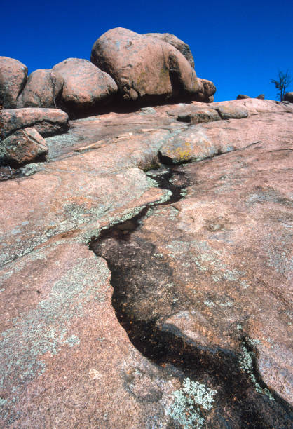 istock Elephant Rocks State Park - Pink Granite Boulders Vertical - 2002 1217913342