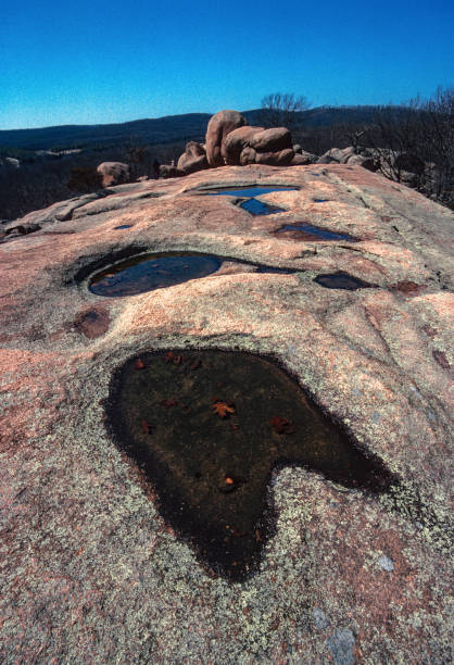 istock Elephant Rocks State Park - Large Potholes in Pink Granite Vertical - 2002 1217914302