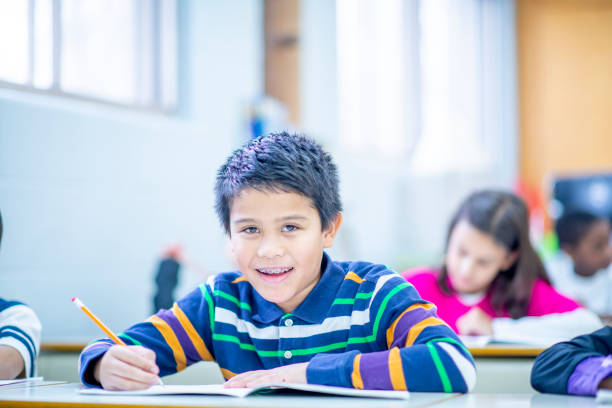 istock Diverse group of kids in the classroom 1217921139