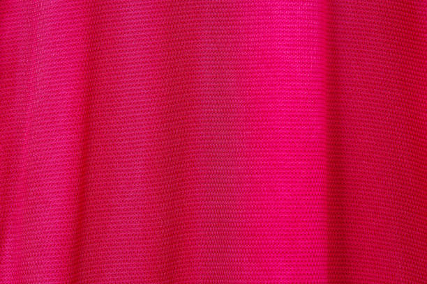 istock Close up Orange, Red, Yellow colour fabric texture. Textile background. 1217923174