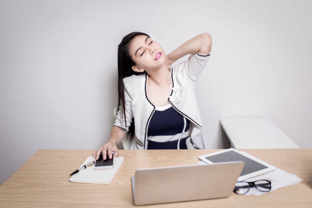 istock Women's tired from work on table work in quarantine for coronavirus 2019 disease. Work from home concepts. 1217923198