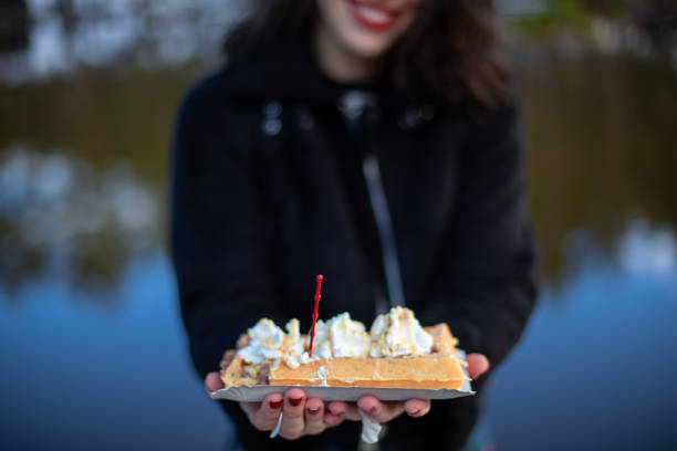 istock Girls Eating Waffles Lifestyle 1217924194