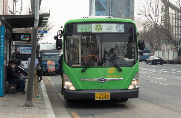 Seoul City Bus Seoul-March 31, 2020: Seoul city bus, green bus operating in Gil-dong, Gangdong-gu seoul bus stock pictures, royalty-free photos & images