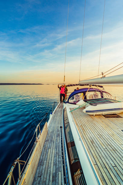 adventure friends on the sailing boat - weather time travel locations nature imagens e fotografias de stock