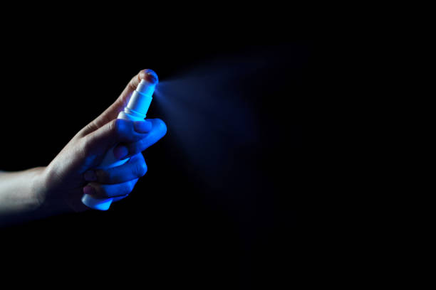 istock Hand using sanitizer spray, alcohol spraying disinfectant to stop spreading  coronavirus or COVID-19. 1217932627