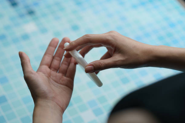 istock Close up woman using  antibacterial hand sanitizer on hands. 1217932671
