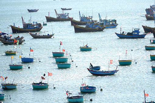 Mui Ne, Vietnam - December 21, 2019: The group of fish boat in Mui Ne, Vietnam.