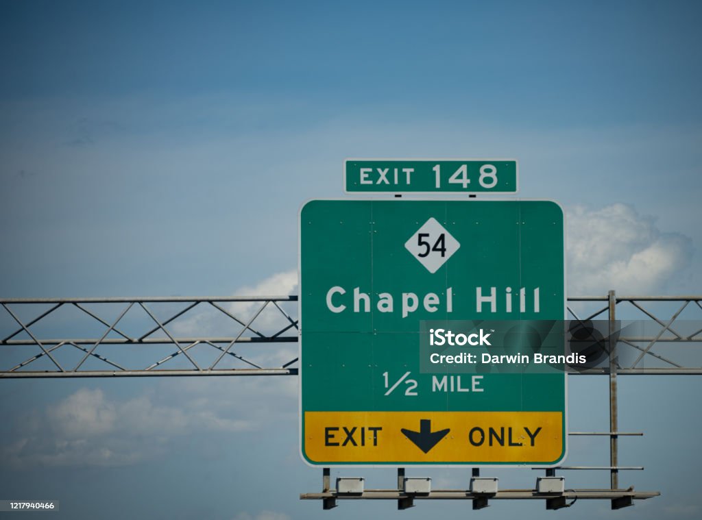Chapel Hill, NC, Highway Sign A highway sign directs travelers to Chapel Hill, NC, USA. Chapel Hill Stock Photo