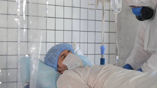 istock Doctor injecting sick patient with experimental vaccine from coronavirus 1217942290