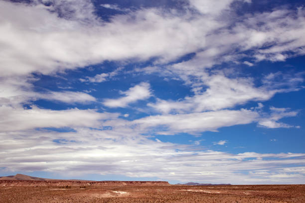 istock Blue sky with clouds in the desert 1217944054