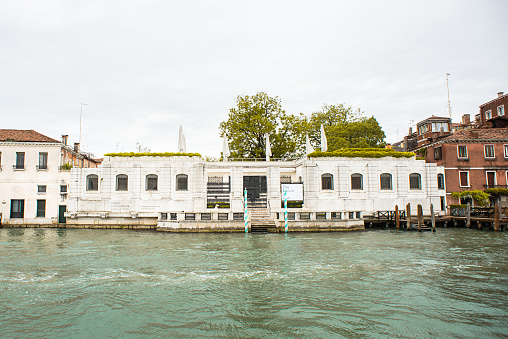 Venice, Veneto, Italy - June 2, 2014: The river entrance to the Municipal Casino seen from the Grand Canal. The renaissance building houses since 1946, the winter home of the oldest gaming house in the world. Stayed here several times the German composer Richard Wagner who died February 13, 1883