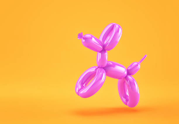 istock Purple balloon dog on orange background 1217945863