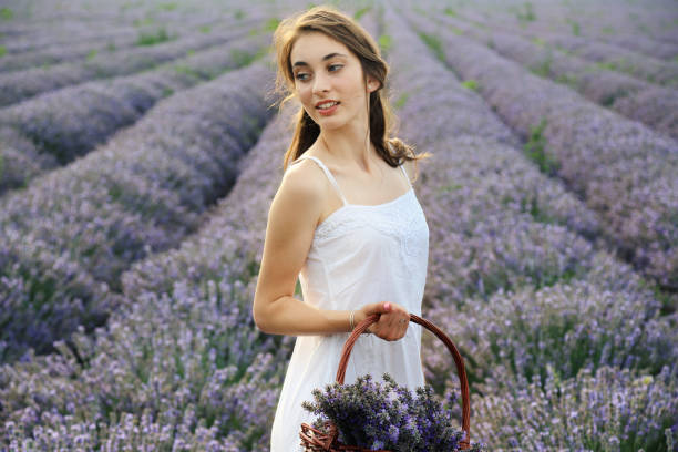 istock Young girl in lavender field 1217945965