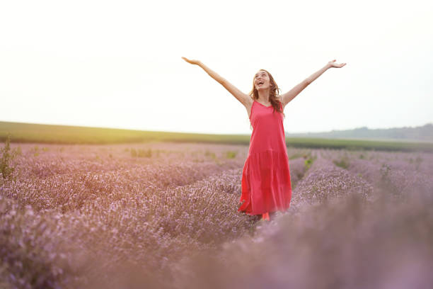 istock Young girl in lavender field 1217945971