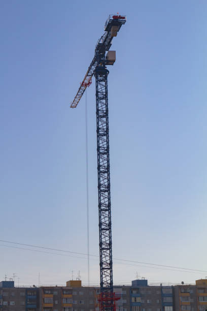 istock High construction crane against the background of blue sky 1217946221