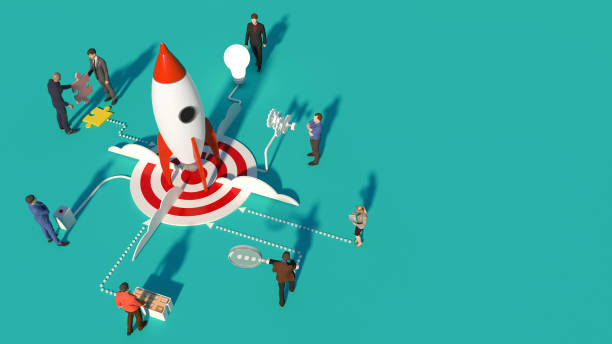 istock 3d rendering  isometric illustration start up concept design, Abstract urban modern style.Team working on spaceship launch start up and big word. Creative idea rocket and object colour collection. 1217947118