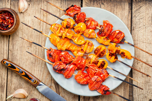 istock Skewers of tomatoes. 1217947136