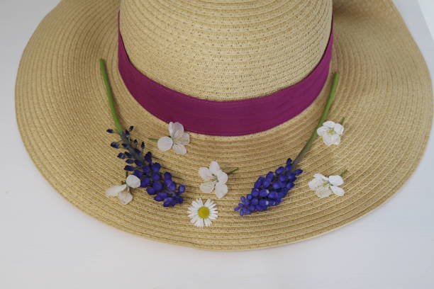 istock summer hat and wild flower 1217948056