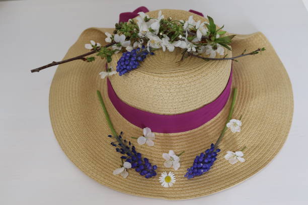 istock summer hat and wild flower 1217948071