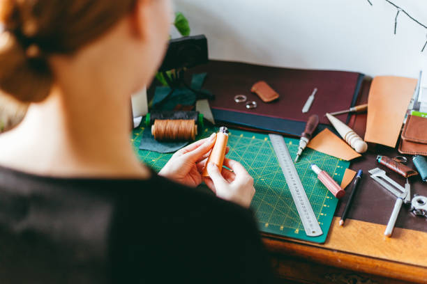 istock Woman working behind desk at home. 1217949273