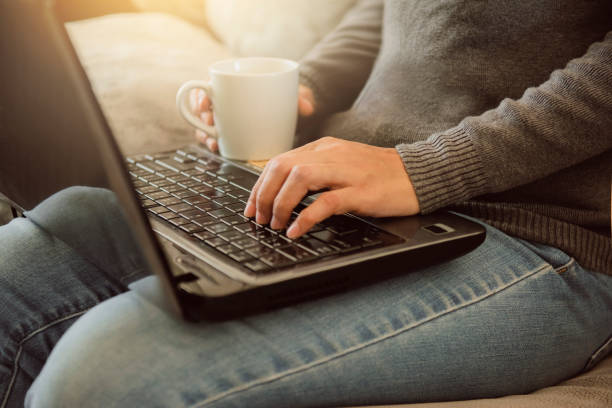 istock Young woman using laptop in office, typing on keyboard.work from home,online learning, studying and startup small business concept. advice to stop coronavirus COVID-19 spreading. 1217953217