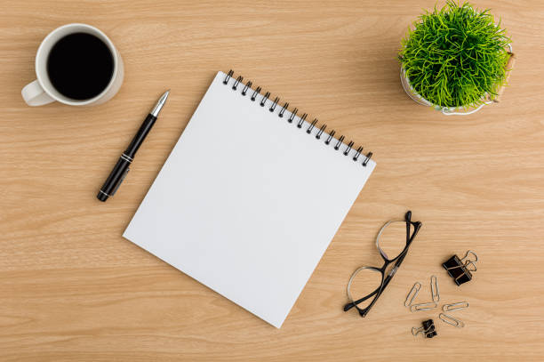 istock Top view Wood office desk table. Flat lay Workspace 1217954618