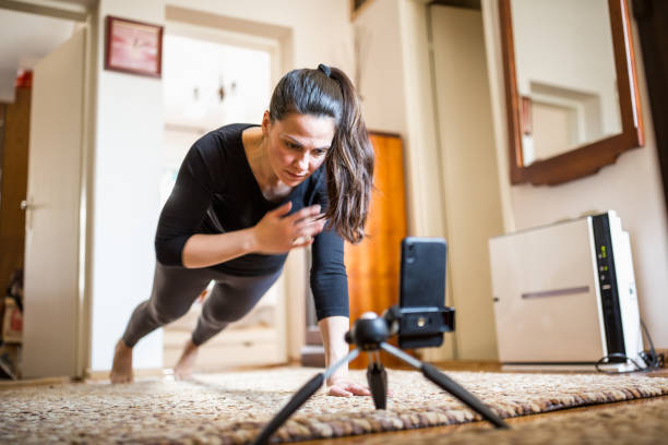 istock Woman home exercising 1217957370
