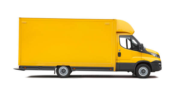 istock Large yellow delivery van with copy space on white background 1217958796