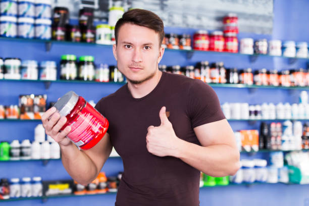 istock muscular man giving thumbs up 1217959753