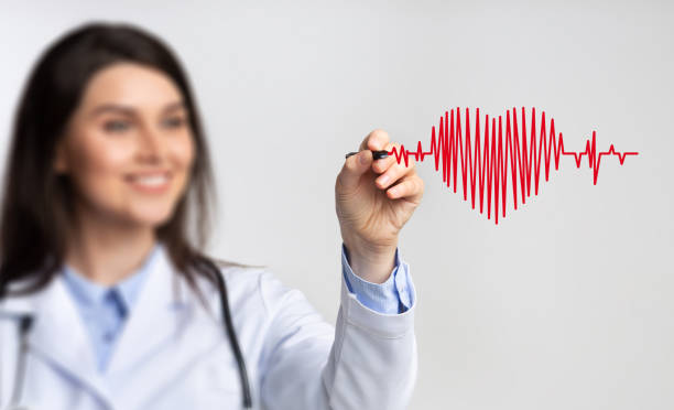 istock Female Doctor Using Stylus Drawing Heart Rate On Invisible Screen 1217962546