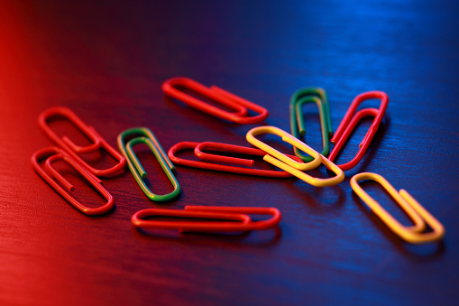 Close up of colorful paper clips.