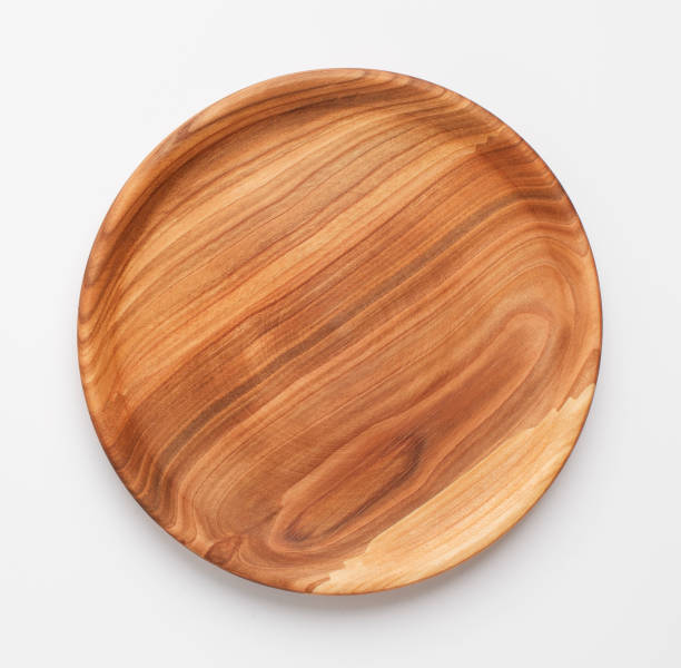 istock Rejection of plastic concept. Wooden dish on white background 1217962700