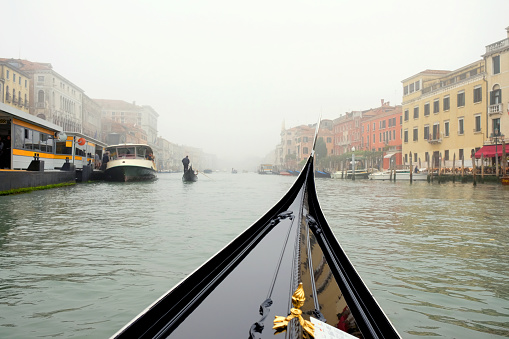 A view from gondola ride through the canals of Venice in Italy