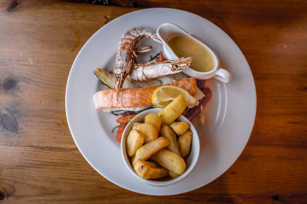 Fried seafood on a plate in pub, UK