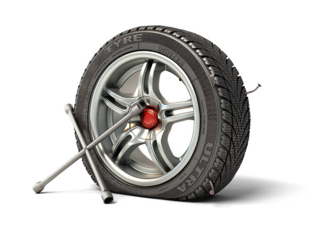 istock tire fitting concept a wheel punched with a nail and a balloon key next to it 3d render on white 1217964249