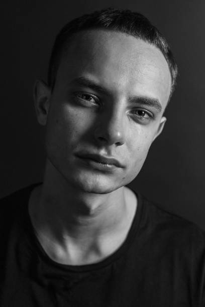 istock Black and White Emotional Portrait Young Man 1217966703