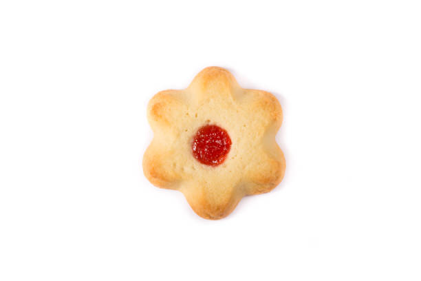 istock Yellow home made cookies with jam on white 1217967074