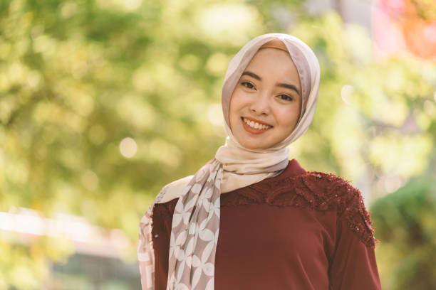 portrait of an young asian female malay smiling testing malay stock pictures, royalty-free photos & images