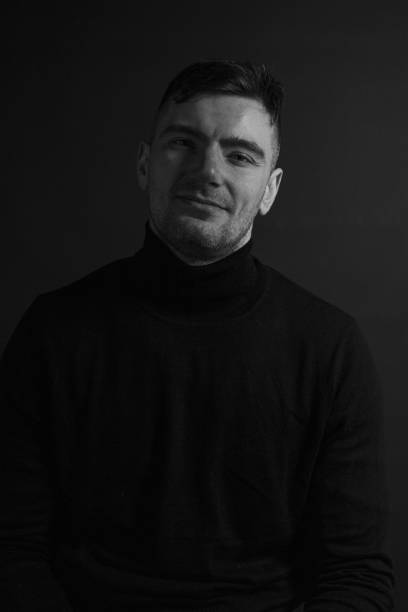 istock Black and White Emotional Portrait Young Man 1217968242