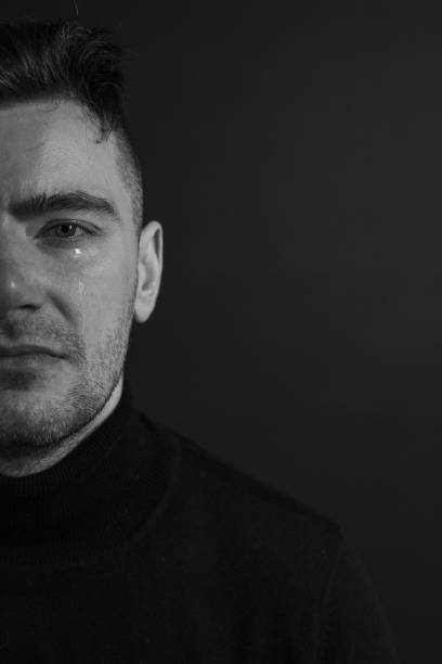 istock Black and White Emotional Portrait Young Man 1217968266