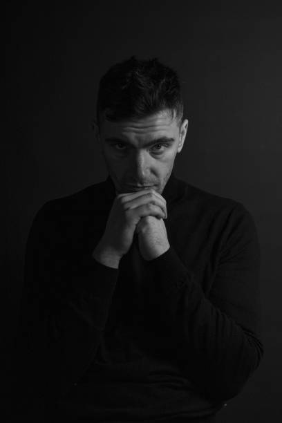 istock Black and White Emotional Portrait Young Man 1217968267