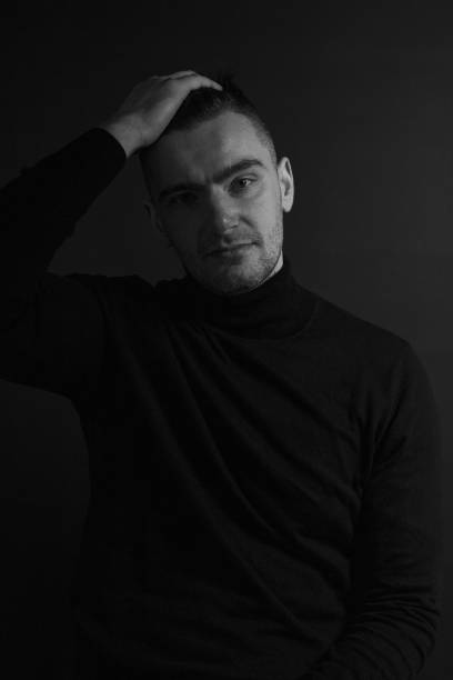 istock Black and White Emotional Portrait Young Man 1217968277